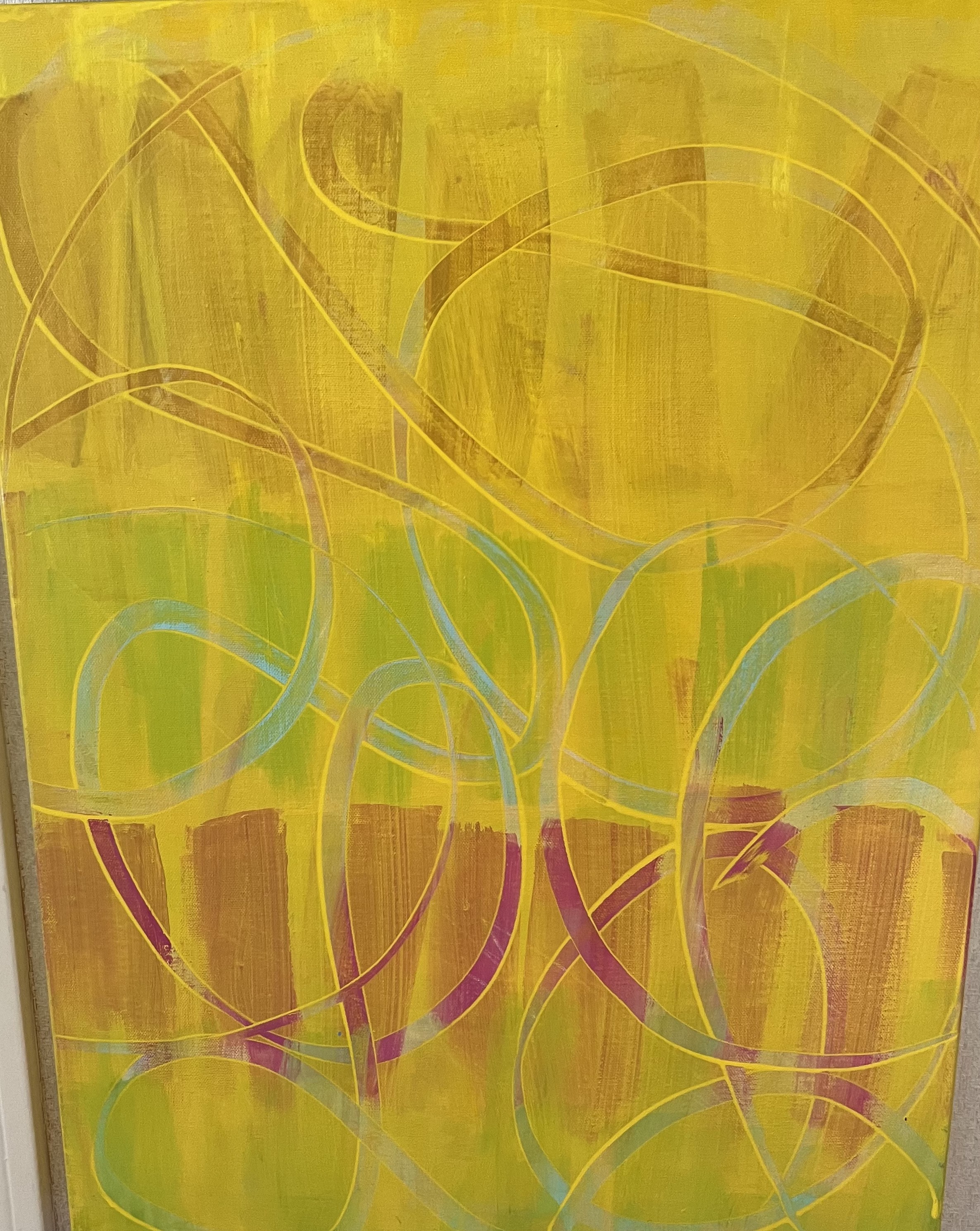 Abstract painting dominated by yellow tones with layered, swirling linear patterns in yellow, green, and magenta over a textured background.