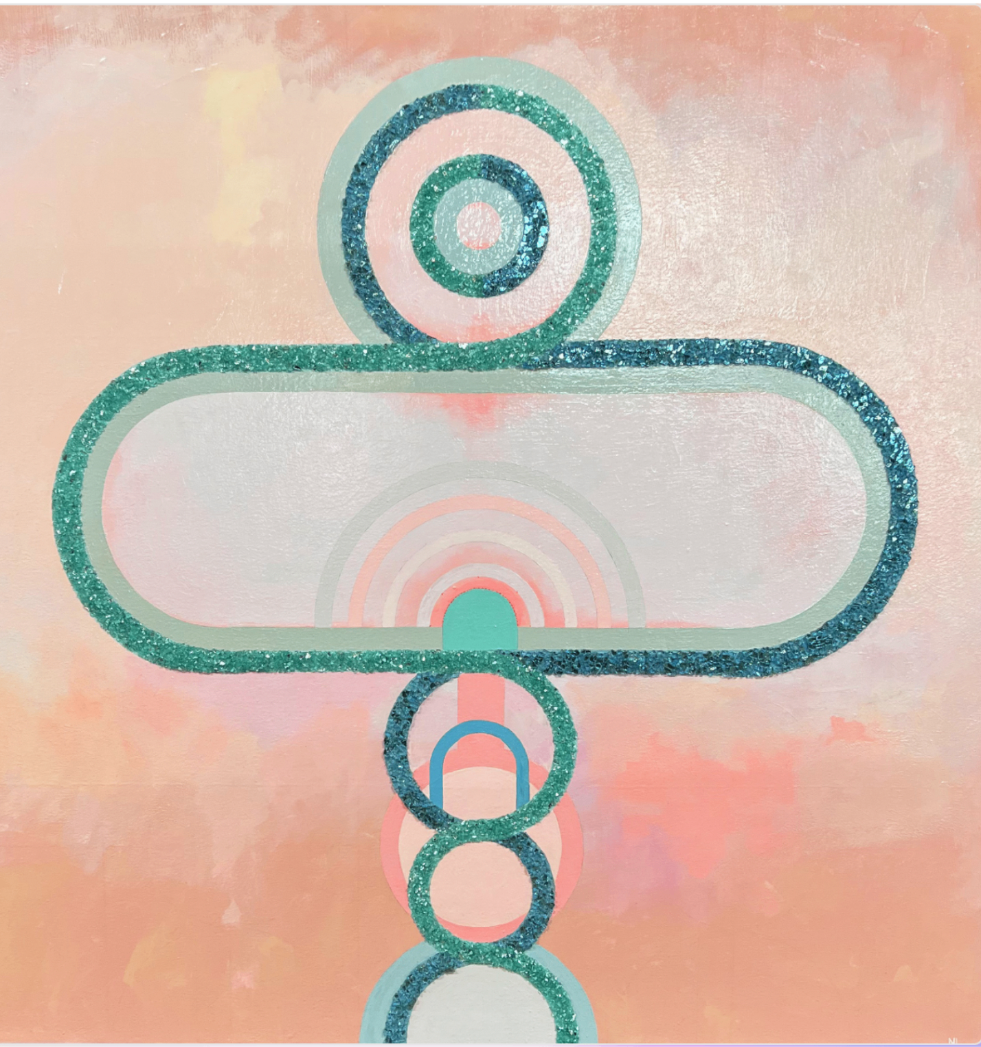 Peach and pearlescent painting with concentric rings, stacked circles, and a pill-shaped form outlined in teal glitter.
